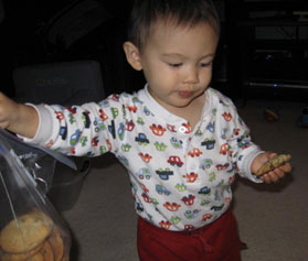 Charlie-with-a-cookie-and-a-bag-of-cookies